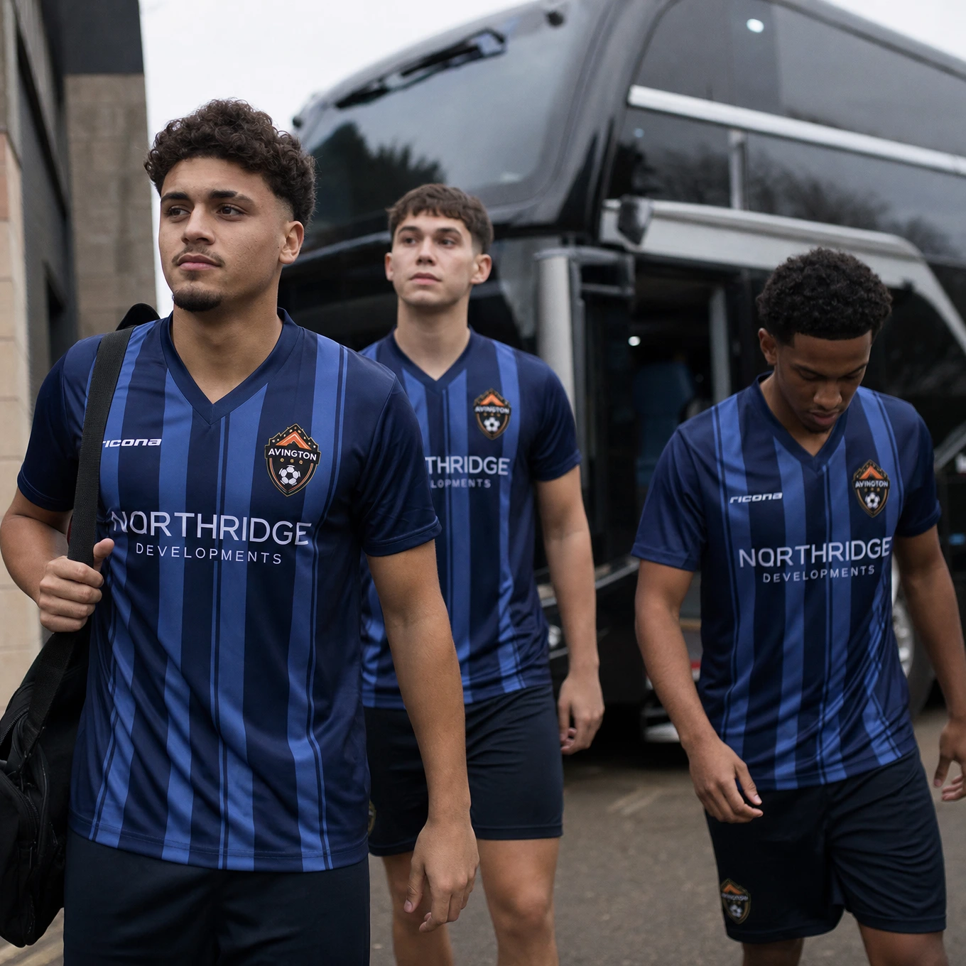 Football team walking in custom blue match kits